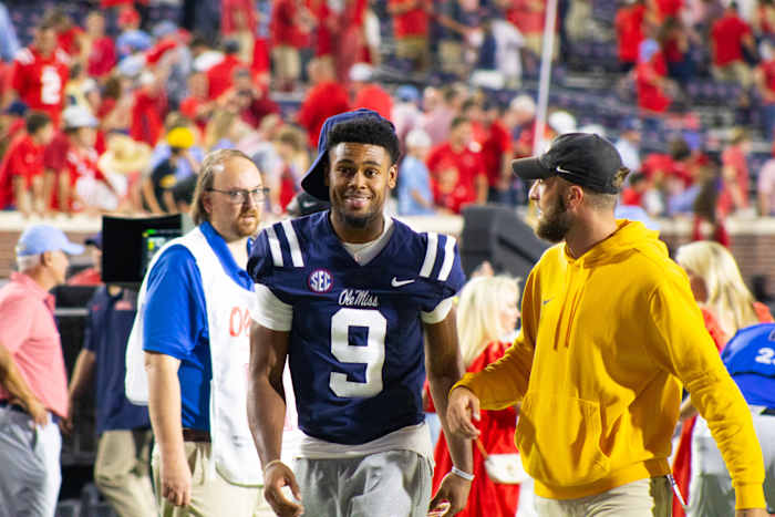 Tre Harris on the sideline last week for the Rebels against Georgia Tech.